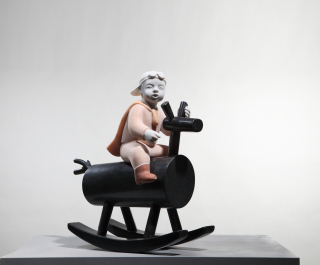 목마탄 아이 · A child on a wooden horse